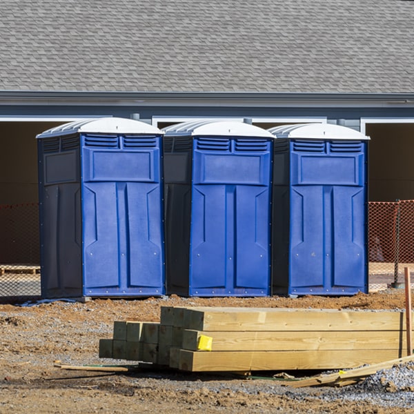 what is the cost difference between standard and deluxe porta potty rentals in Rouses Point NY